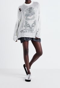 The Ragged Priest Sweter