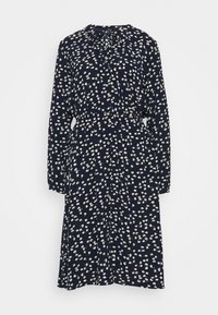 Granatowa sukienka z długimi rękawami, zapięciem na guziki przy kołnierzy oraz kwiatowym wzorem w białym i jasnoróżowym kolorze. Posiada elastyczny pas i długość midi.