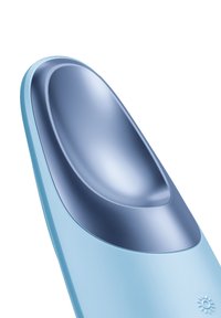 Dispositif ergonomique bleu clair avec un bol bleu marine profond, des bords arrondis et une icône de soleil à la base, conçu pour faciliter l'utilisation.