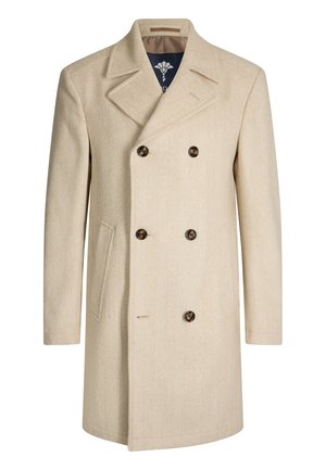 Beiger doppelseitiger Wollmantel mit Fischgrätenmuster, großen Revers und braunen Knöpfen. Ausgestattet mit einer einzelnen Seiten- tasche und gefüttertem Innenfutter.