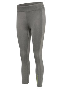 Grå leggings i ett smidigt, stretchigt tyg. Hög midja, avsmalnande ben, subtil textur och en liten grön logotyp nära fållen.