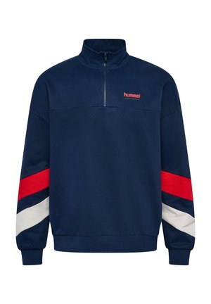 Navy blue fleece pullover with a high collar and half-zip. Features red, white, and blue diagonal stripes along the sleeves. Hummel logo in red.