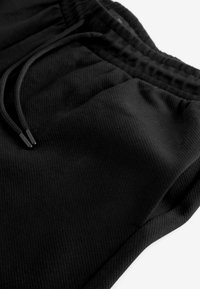Next SMART JOGGERS REGULAR FIT - Verryttelyhousut - black