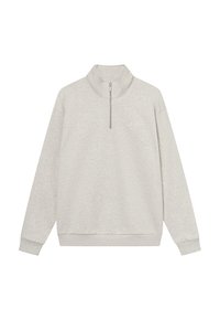 Gaiši pelēks piedurkņu krekls ar pusi rāvējslēdzēju, brīva piegriezuma un ribotām piedurknēm. Izgatavots no mīksta auduma, ar minimālistisku zīmolu uz krūtīm.