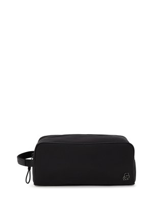 Black rectangular toiletry bag with a side handle and zipper, featuring a small stylized logo on the lower right corner.