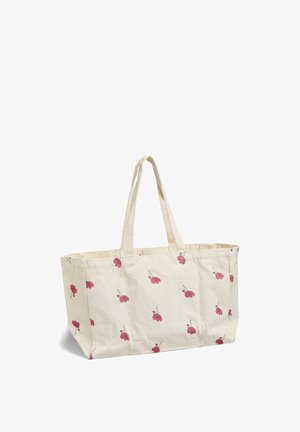 Płócienna torba na ramię w kolorze kremowym z czerwonym kwiatowym nadrukiem i dwoma długimi uchwytami, prezentowana na białym tle.