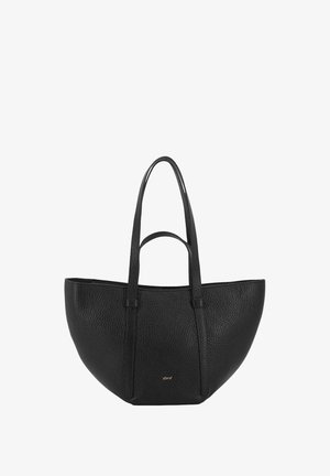 Black textured leather tote bag with dual long handles and a small gold "abrò" logo on the front center.