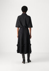 Marimekko KUMARRUS UNIKKO - Fustă în formă de A - black
