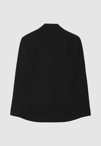 Cappotto nero, misto lana, design sartoriale, taglio dritto, senza chiusure, texture liscia, linee pulite, vista posteriore con dettagli delle cuciture sottili.