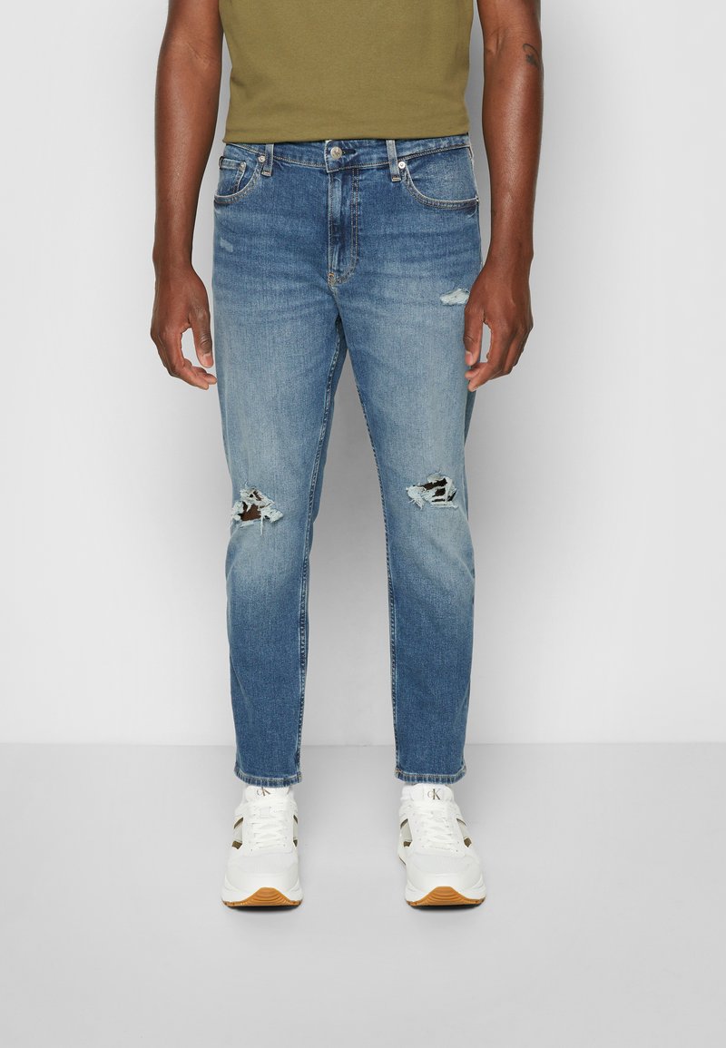 champignon Fatal Faial Calvin Klein Jeans DAD - Jeans Tapered Fit - denim dark/dark-blue denim -  Zalando.co.uk