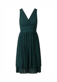 Grön plisserad klänning med djup V-ringning och breda axelremmar, som har en figurnära överdel och ett flödande kjol som når till halva vaden.