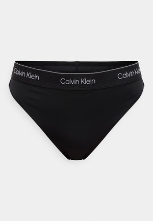 Czarne bikini z gładką teksturą i elastycznym pasem z białym logo "Calvin Klein". Prosty i funkcjonalny design.