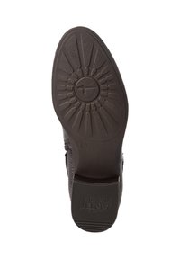 Suela de zapato de goma marrón con un patrón de agarre texturizado y marca en relieve. Muestra la talla 37. Diseño de bajo perfil con bordes redondeados.