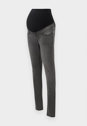 Raskouluousut raskaana oleville, joissa on musta joustava vyötärö, harmaa denimi, kapeamuotoinen malli ja taskut. Keskitytään sileään pintaan ja siisteihin linjoihin.