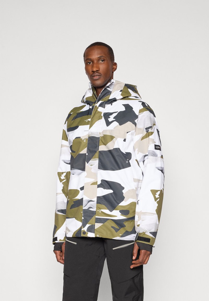 Kamerás dzseki fehér, zöld és szürke árnyalatokban; kapucnival, elöl cipzárral és rugalmas részletekkel ellátott, állítható mandzsettákkal rendelkezik.