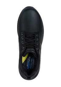 Sneaker nera in sintetico con lacci, texture liscia, colletto imbottito e accento giallo a contrasto all'interno. Impermeabile con soletta imbottita.