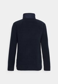 Marineblaue Fleecejacke mit hohem Kragen, langen Ärmeln und weicher Textur. Verfügt über eine glatte Oberfläche und ein lässiges Design.