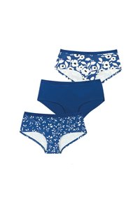 Trois culottes taille basse bleues pour femmes, deux avec des motifs floraux et de feuilles blancs, une en bleu uni, disposées sur un fond blanc.