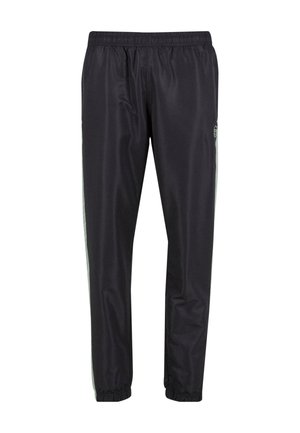 Mustad mustrisportlikud püksid elastse vöökoha ja sääreotstega, millel on heleda halli värvi külgtriibud ning väike ümmargune logo paremal reiel.