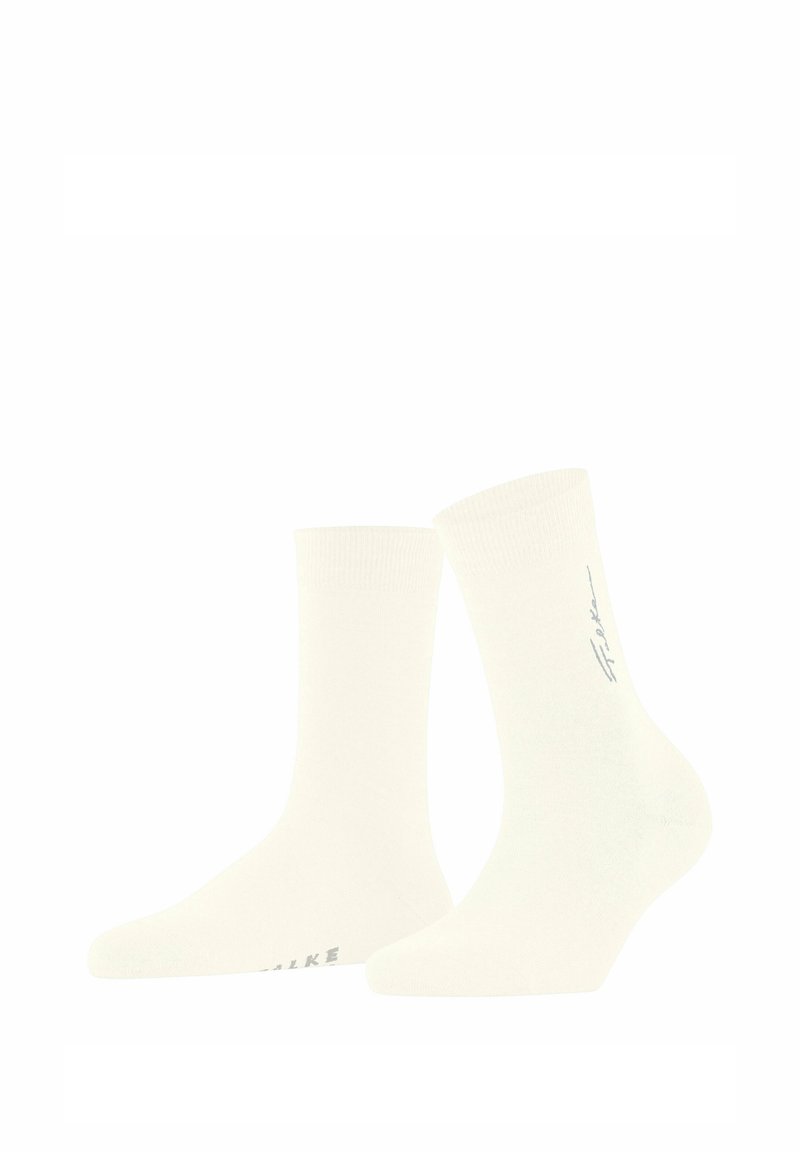 Calze a girocotone bianche in cotone con una texture liscia. Presentano un bordo a costine e un discreto logo vicino alla punta. Forma standard delle calze.