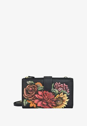 Zwarte leren portemonnee met bloemmotieven in rood, roze, oranje en geel. Inclusief een drukknoopsluiting en een verstelbare schouderband.