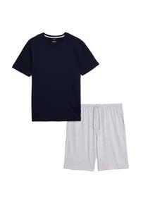 Camiseta de algodón marino con cuello redondo y mangas cortas, combinada con pantalones cortos de cordón en gris claro, hechos de suave tela de jersey.
