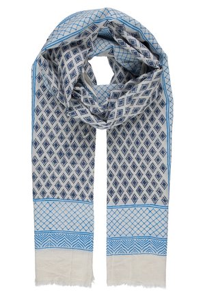 Écharpe gris clair avec motif de losanges bleu foncé, bordures géométriques bleues et bords frangés, pliée en boucle lâche.