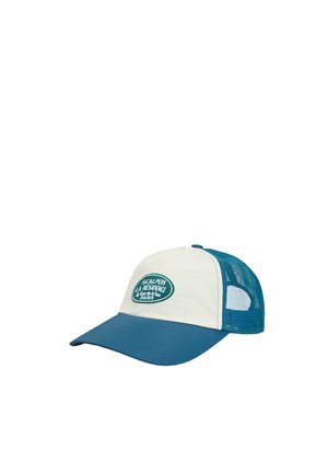 Gorra de béisbol con visera azul, panel frontal blanco, malla azul en la parte trasera y parche ovalado con la inscripción "Scalpers La Residence Paris" en el frente.