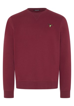 Maroon sweatshirt made of soft fabric, crew neck, ribbed cuffs, and hem. Features a small green logo embellishment on the chest.