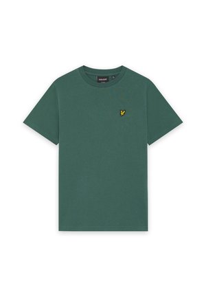 Zaļš īsroku T-krekls ar apaļu kakla izgriezumu, kreisajā krūtīs neliels dzeltens putna logotips un melna etiķete apkakles iekšpusē.