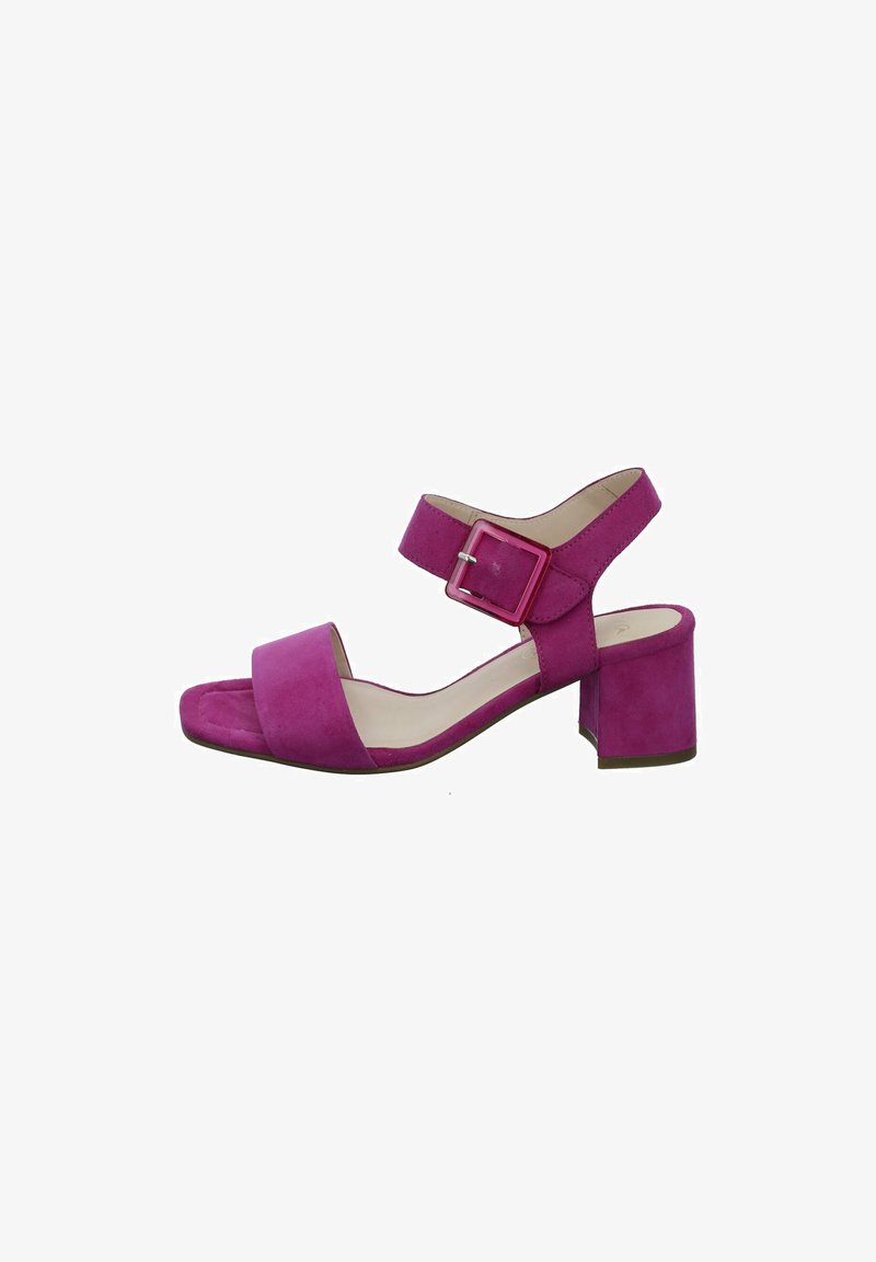 Fuchsia suede heeled sandals with a square toe, ankle strap, and a square buckle closure. Block heel for stability. Smooth interior lining.
