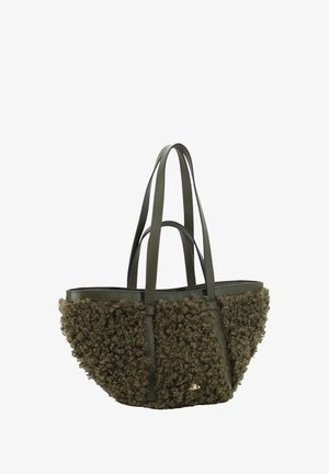 Olive green tote bag featuring curly textured fabric on the front, smooth leather sides, reinforced handles, and a small gold logo detail.