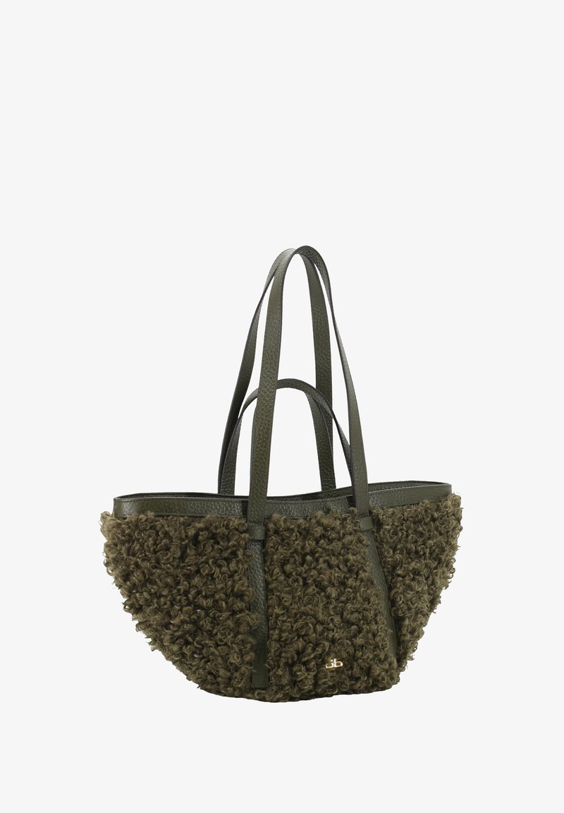 Olive green tote bag featuring curly textured fabric on the front, smooth leather sides, reinforced handles, and a small gold logo detail.