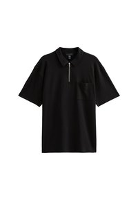 Zwarte polo shirt van katoenmix, met een halve rits aan de voorkant, korte mouwen en een borstzak aan de linkerkant. Glad textuur, ontspannen pasvorm.