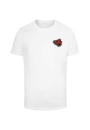 T-shirt bianca in cotone con un piccolo design ricamato di rose rosse e foglie verdi sulla parte sinistra del petto. Maniche corte, vestibilità classica.