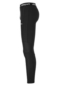 Collants de sport noirs avec un design ajusté. Fabriqués en matériau synthétique extensible, ils présentent une taille avec le logo "uhlsport".