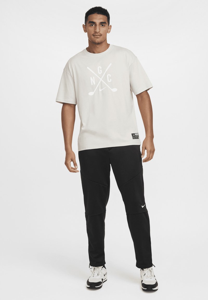 Nike Golf T-shirt print zandkleur Nike Golf T-shirt print zandkleur