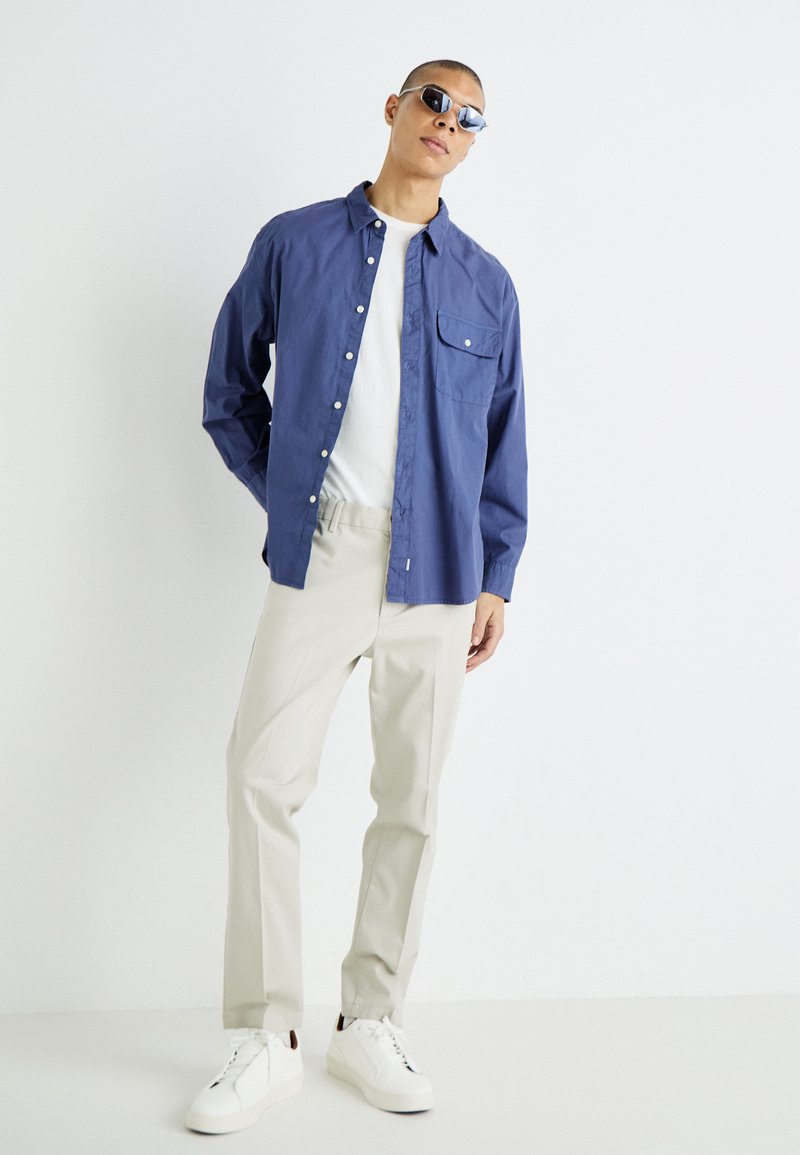 Pull Polo Homme Dockers Bleu Clair Taille M - 100% Coton, Col Avec 2 Boutons, Neuf Avec étiquettes