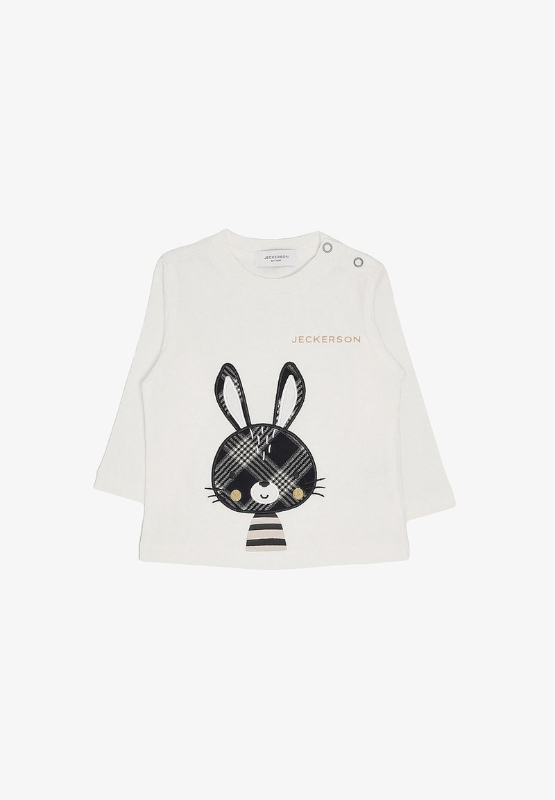 Camicia bianca a maniche lunghe con un design di coniglio a quadri bianco e nero, caratterizzata da accenti gialli e bottoni a pressione sulla spalla.