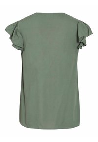 Top verde de manga corta con acentos de hombros con volantes, un corte holgado y una textura suave, adecuado para el uso casual.