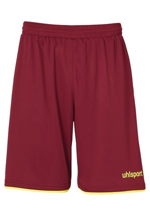 Maroon sports shorts with an elastic waistband, featuring a yellow trim at the hems and a "uhlsport" logo in yellow on the bottom right.
