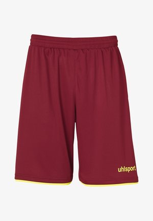 Maroon sports shorts with an elastic waistband, featuring a yellow trim at the hems and a "uhlsport" logo in yellow on the bottom right.