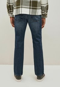 Next DEEP FIT WITH STRETCH - Šiek tiek platėjantys apačioje džinsai - vintage blue