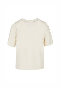 Cream-colored cotton t-shirt, short sleeves, round neckline, relaxed fit, smooth texture, no visible patterns or embellishments.