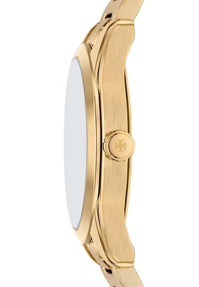Boîtier et bracelet de montre en or fin avec une couronne polie présentant un logo en forme de croix, montré de côté sur fond blanc.