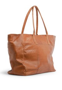 Brown leather tote bag with two long handles, featuring a soft texture, rectangular shape, and subtle stitching details.