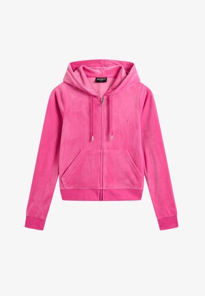 Pink velvet zip-up hoodie with a drawstring hood, front pockets, ribbed cuffs, and a small embroidered logo on the left chest.