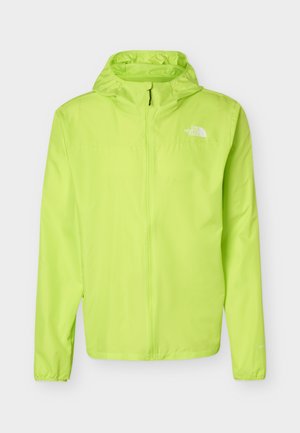 Világos lime zöld, könnyű kapucnis dzseki teljes elöl cipzárral és fehér The North Face logóval a bal mellrészen.