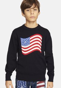 Black sweater featuring an American flag design. The flag is knit with red stripes and blue field with stars. Ribbed cuffs and hem.