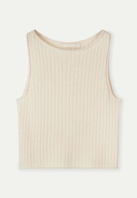 Ribbad linne i ljus beige, tillverkat av ekologiskt material. Har en rund halsringning och breda ärmhål med en skräddarsydd passform.